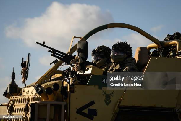 Soldiers from the 2nd Battalion The Royal Anglian Regiment, also known as 'The Poachers', are seen on a Jackal 2 high mobility weapons platform...