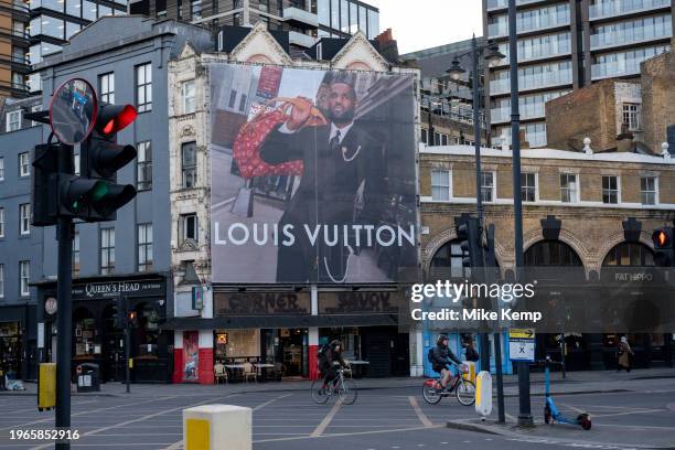 Large scale advertisement for Louis Vuitton in Shoreditch on 15th January 2024 in London, United Kingdom. Louis Vuitton Malletier, commonly referred...
