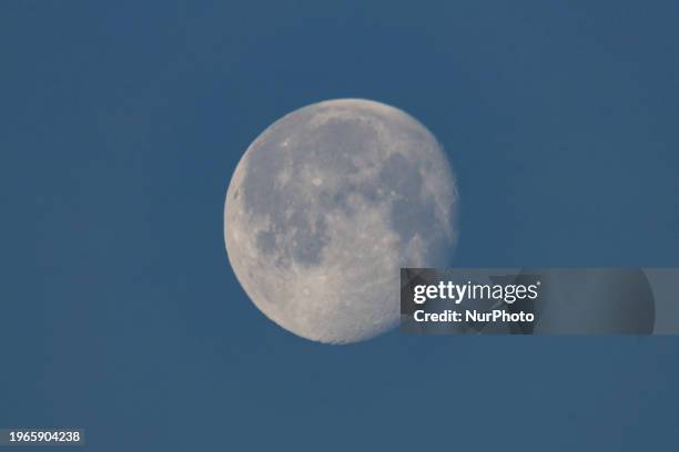 The moon as spotted in the blue Dutch sky from Eindhoven, the Netherlands during the Waning Gibbous phase, after the Wolf Full Moon, at an...