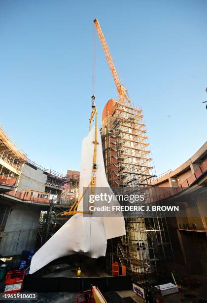 The Space Shuttle Endeavour, a retired orbiter from NASA's Space Shuttle program which was the fifth and final operational shuttle, stands in a...