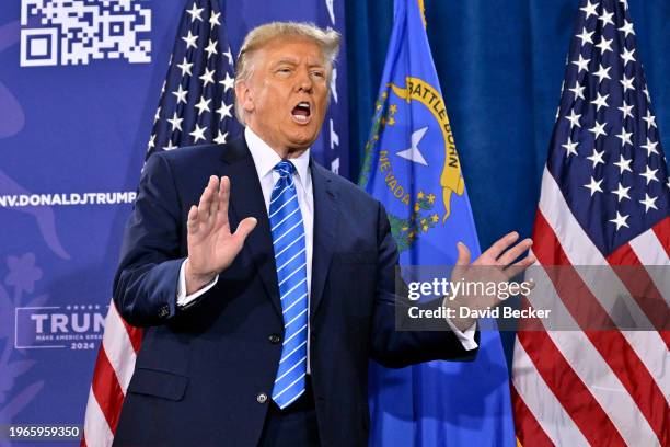 Republican presidential candidate and former U.S. President Donald Trump stands on stage during a campaign event at Big League Dreams Las Vegas on...