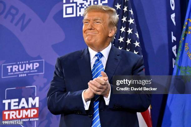 Republican presidential candidate and former U.S. President Donald Trump stands on stage during a campaign event at Big League Dreams Las Vegas on...