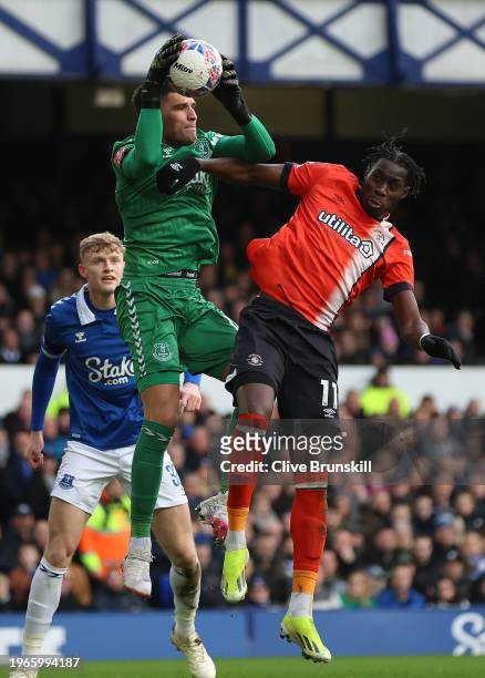 Joao Virginia of Everton saves from Elijah Adebayo of Luton Town during the Emirates FA Cup Fourth Round match between Liverpool and Norwich City at...