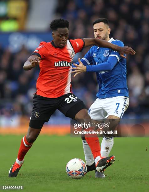 Albert Sambi Lokonga of Luton Town is challenged by Dwight McNeil of Everton during the Emirates FA Cup Fourth Round match between Liverpool and...