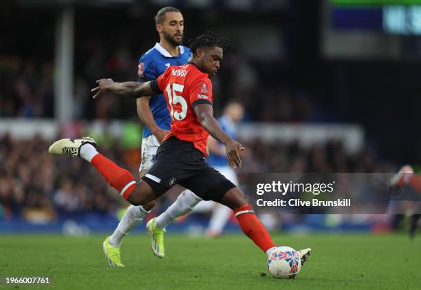 Teden Mengi of Luton Town attempts to clear the ball from Dominic Calvert-Lewin of Everton during the Emirates FA Cup Fourth Round match between...