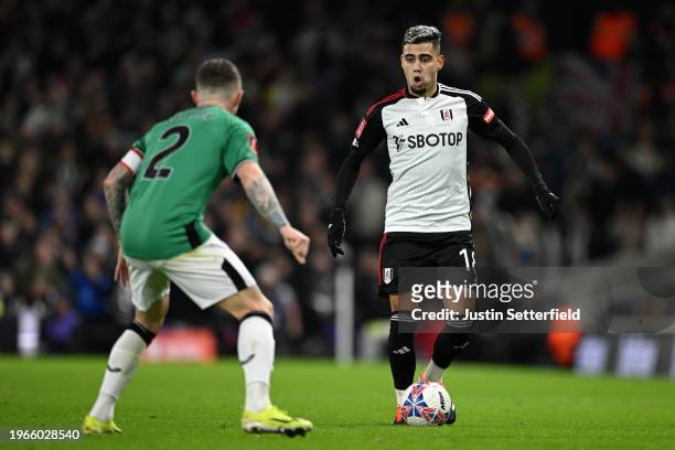 Andreas Pereira of Fulham takes on Kieran Trippier of Newcastle United during the Emirates FA Cup Fourth Round match between Fulham and Newcastle...