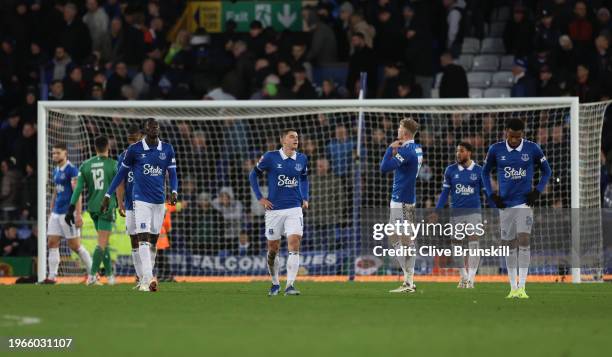 Everton's Vitally Mykolenko Jarrad Branthwaite and Youssef Chermiti show their dejection after their team conceded a last minute Luton Town winning...