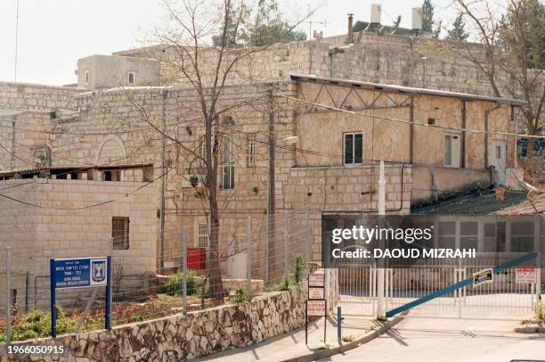 Old Arab buildings 09 April remain from the village of Deir Yassin, now part of a mental hospital in Jerusalem, where 50 years ago irregular Jewish...