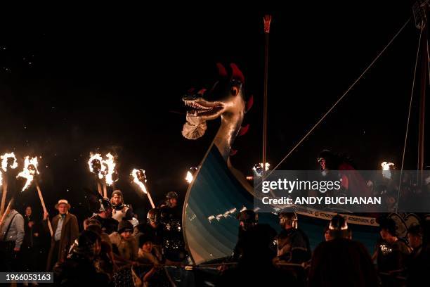 Members of the Up Helly Aa 'Jarl Squad' parade through the streets of in Lerwick, Shetland Islands on January 30, 2024 during the Up Helly Aa...