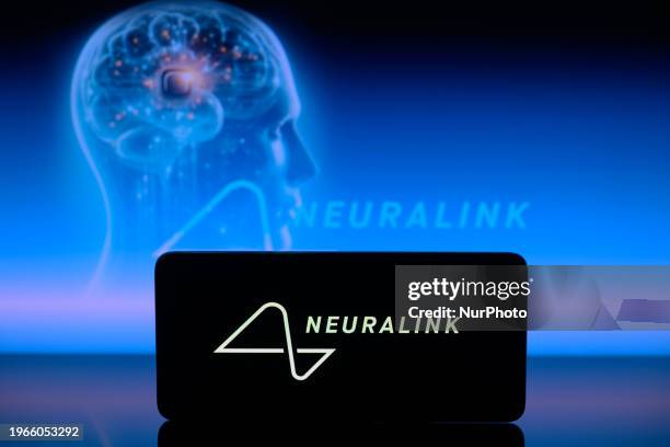 The Neuralink logo is displayed on a smartphone with Neuralink visible in the background in this photo illustration in Brussels, Belgium, on January...