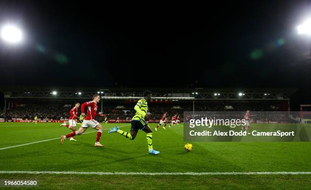 Arsenal's Bukayo Saka runs up the wing during the Premier League match between Nottingham Forest and Arsenal at the City Ground on January 30, 2024...