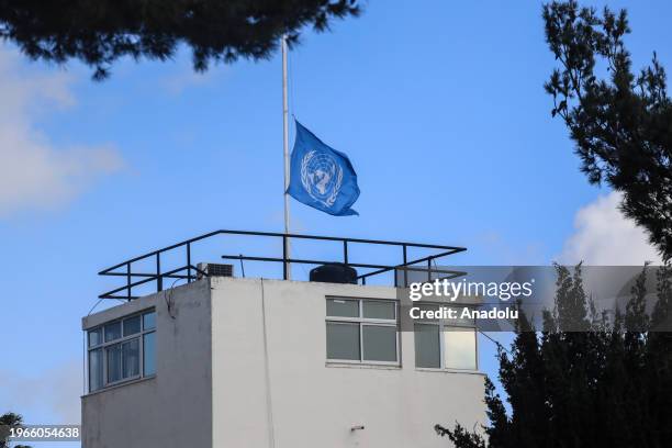 Flag flying at half-mast is seen at UNRWA school as UNRWA persists in its training initiatives in Silwan, Jerusalem on January 30, 2024. UNRWA is...