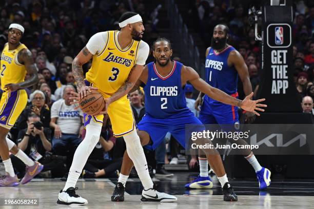 Anthony Davis of the Los Angeles Lakers looks to pass the ball during the game against the LA Clippers on January 23, 2024 at Crypto.Com Arena in Los...