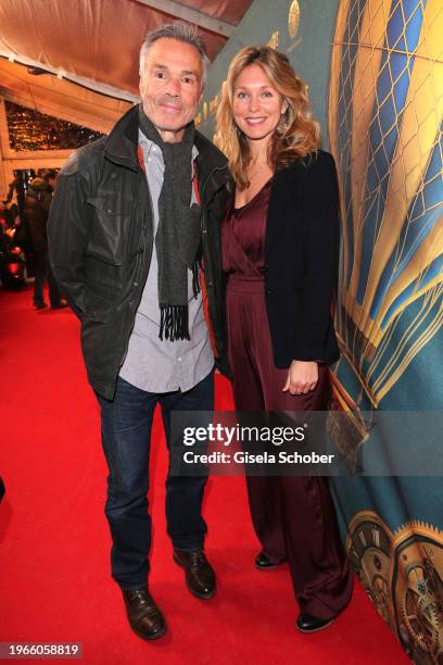 Hannes Jaenicke and Stephanie Krogmann attend the Munich premiere of "Cirque du Soleil - Kurios Muenchen" at Theresienwiese on January 30, 2024 in...