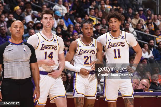 Colin Castleton, Maxwell Lewis and Jaxson Hayes Of the Los Angeles Lakers look on during the game against the Portland Trail Blazers on January 21,...