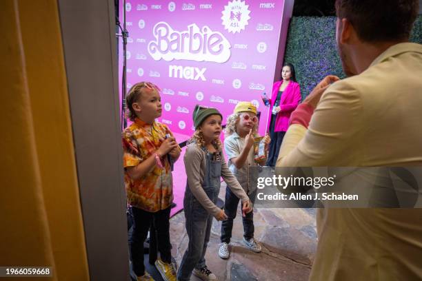 Westwood, CA Tommy Korn, right, records Lavern Korn left, Ayla Korn middle, and Gray Korn signing as they arrive to attend the US. Deaf West and Max...