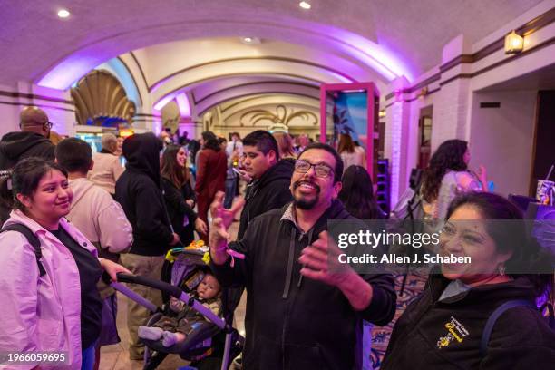 Westwood, CA Jose Valencia, center, shown with his family, signs while attending the US. Deaf West and Max hosting a special open caption screening...