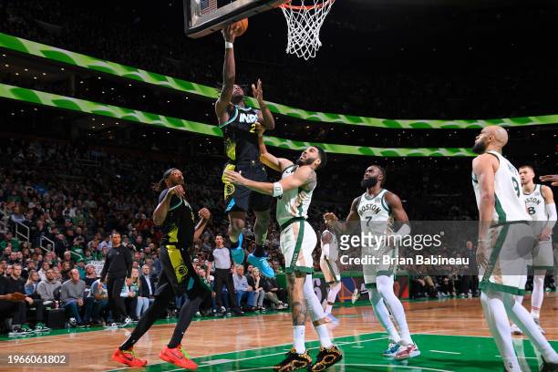 Aaron Nesmith of the Indiana Pacers drives to the basket during the game against the Boston Celtics on January 30, 2024 at the TD Garden in Boston,...