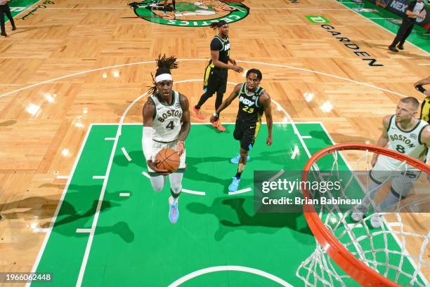 Jrue Holiday of the Boston Celtics drives to the basket during the game against the Indiana Pacers on January 30, 2024 at the TD Garden in Boston,...