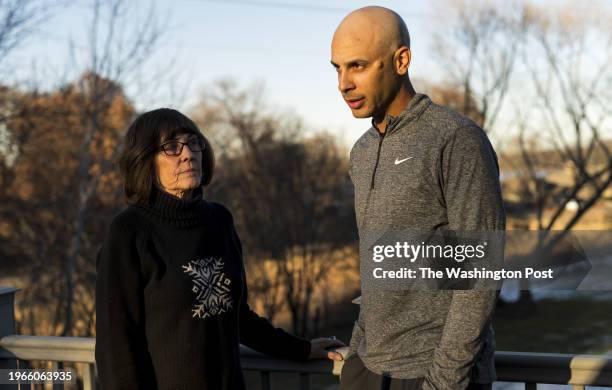 Liz Cross , widow of former NFL player Irv Cross, speaks her son Matthew Cross at their home in Roseville, Minnesota on December 13, 2023. Irv Cross...