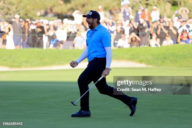 Matthieu Pavon of France celebrates on the 18th green after making birdie to win the Farmers Insurance Open at Torrey Pines South Course on January...