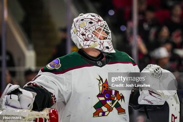 Connor Ingram of the Arizona Coyotes looks on during the first period against the Carolina Hurricanes at PNC Arena on January 27, 2024 in Raleigh,...