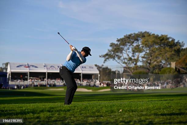 Matthieu Pavon of France plays his shot on the 18th hole during the final round of the Farmers Insurance Open at Torrey Pines South Course on January...