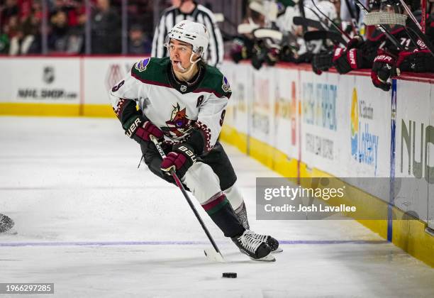 Clayton Keller of the Arizona Coyotes skates during the second period against the Carolina Hurricanes at PNC Arena on January 27, 2024 in Raleigh,...