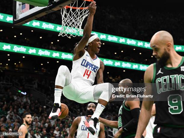 Terance Mann of the LA Clippers dunks and scores against the Boston Celtics during the third quarter at the TD Garden on January 27, 2024 in Boston,...