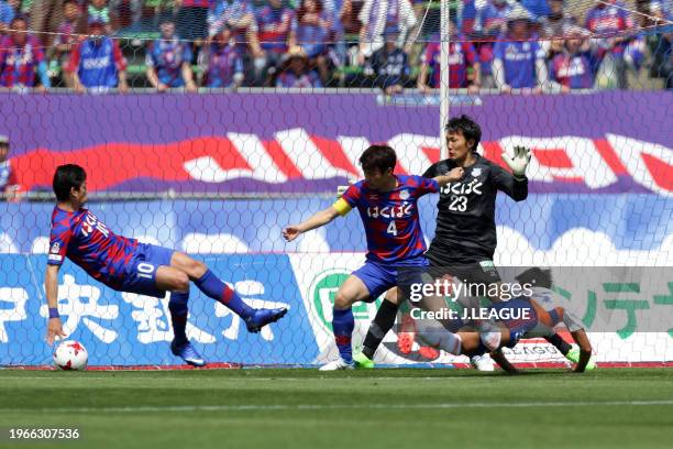 Teruki Hara of Albirex Niigata dives to score the team's first goal during the J.League J1 match between Ventforet Kofu and Albirex Niigata at...