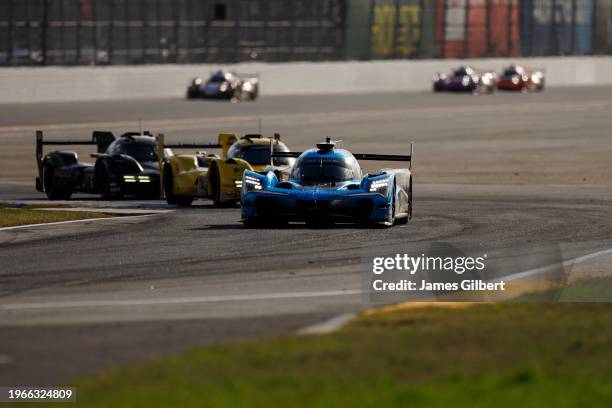 The Wayne Taylor Racing Acura ARX-06 of Ricky Taylor, Filipe Albuquerque, Brendon Hartley and Marcus Ericsson drives during the Rolex 24 at Daytona...