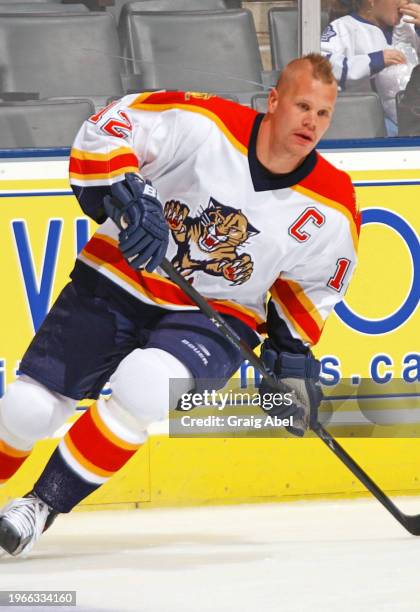 Olli Jokinen of Florida Panthers Leafs skates against the Toronto Maple Leafs during NHL game action on March 9, 2004 at Air Canada Centre in...