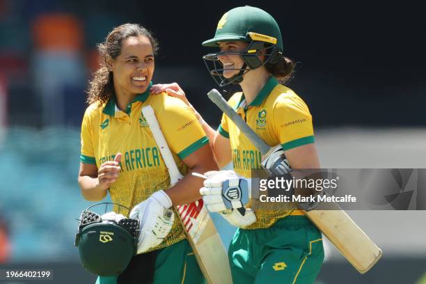 Chloe Tryon of and Laura Wolvaardt of South Africa celebrate victory during game two of the Women's T20 International series between Australia and...