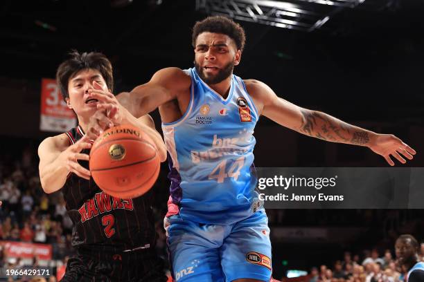 Hyunjung Lee of the Hawks competes for the ball with Anthony Lamb of the Breakers during the round 17 NBL match between Illawarra Hawks and New...