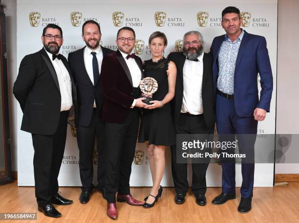 Richard Elis and Spencer Wilding with Mei Williams, Tim Rhys Evans, Gwenllian Hughes and Madoc Roberts winners of Single Documentary Award for Tim...