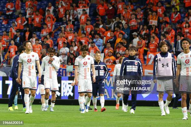 Omiya Ardija players look dejected after the team's 0-6 defeat in the J.League J1 match between Gamba Osaka and Omiya Ardija at Suita City Football...