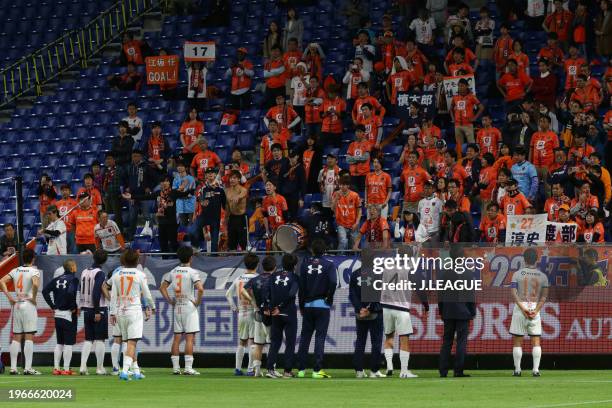 Omiya Ardija players applaud fans after the team's 0-6 defeat in the J.League J1 match between Gamba Osaka and Omiya Ardija at Suita City Football...