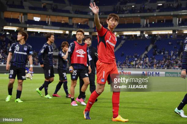 Masaaki Higashiguchi and Gamba Osaka players applaud fans after the team's 6-0 victory in the J.League J1 match between Gamba Osaka and Omiya Ardija...