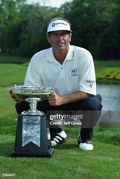 Fred Couples poses with the trophy after winning the Shell Houston Open on April 27, 2003 at the Redstone Golf Club in Humble, Texas.