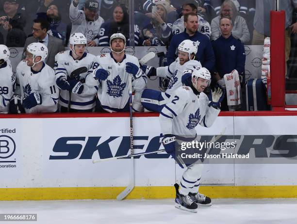 Simon Benoit of the Toronto Maple Leafs celebrates his goal during action against the Winnipeg Jets in the third period during a game on January 27,...