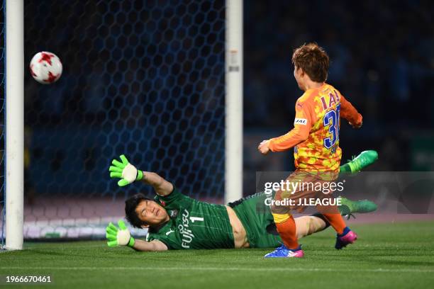 Shota Kaneko of Shimizu S-Pulse scores the team's first goal past Jung Sung-ryong of Kawasaki Frontale, the 20,000th goal of the J1 during the...