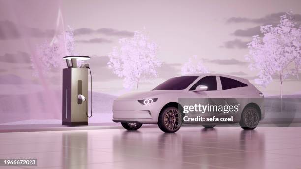 electric car charging at the electric vehicle charging station - digital catwalk stock pictures, royalty-free photos & images
