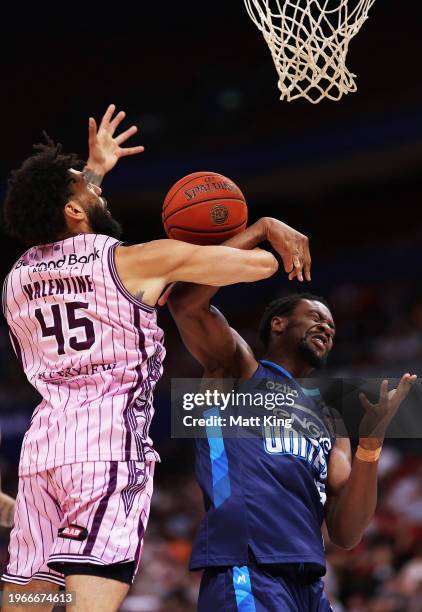 Denzel Valentine of the Kings competes for the ball against Ariel Hukporti of United during the round 17 NBL match between Sydney Kings and Melbourne...