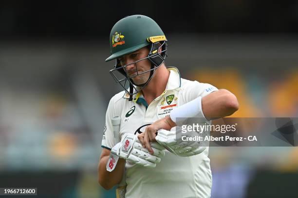 Pat Cummins of Australia leaves the field after being dismissed during day four of the Second Test match in the series between Australia and West...
