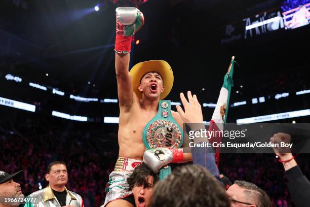 Jaime Munguia celebrates after defeating John Ryder in a fight at Footprint Center on January 27, 2024 in Phoenix, Arizona.
