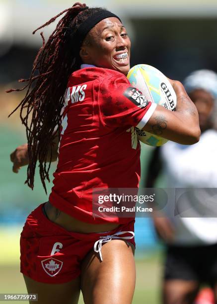 Charity Williams of Canada runs in for a try the 2024 Perth SVNS women's match between Fiji and Canada at HBF Park on January 28, 2024 in Perth,...