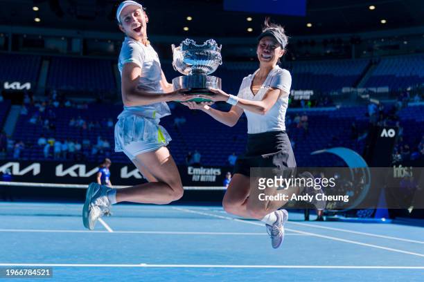 Su-Wei Hsieh of Chinese Taipei and Elise Mertens of Belgium pose with the championship trophy after winning their Women’s Doubles Finals match...
