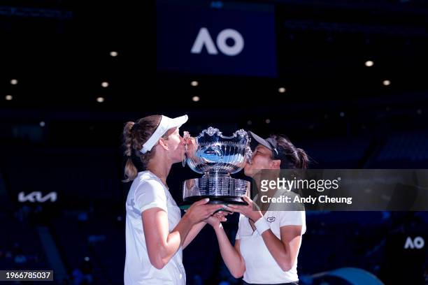 Su-Wei Hsieh of Chinese Taipei and Elise Mertens of Belgium kiss the championship trophy after winning their Women’s Doubles Finals match against...