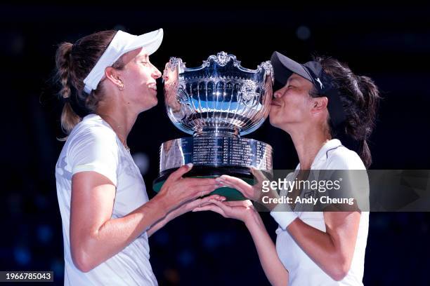 Su-Wei Hsieh of Chinese Taipei and Elise Mertens of Belgium kiss the championship trophy after winning their Women’s Doubles Finals match against...