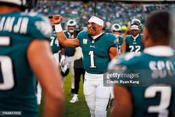 Jalen Hurts of the Philadelphia Eagles is seen in the team huddle during pregame warmups before an NFL football game against the Dallas Cowboys at...